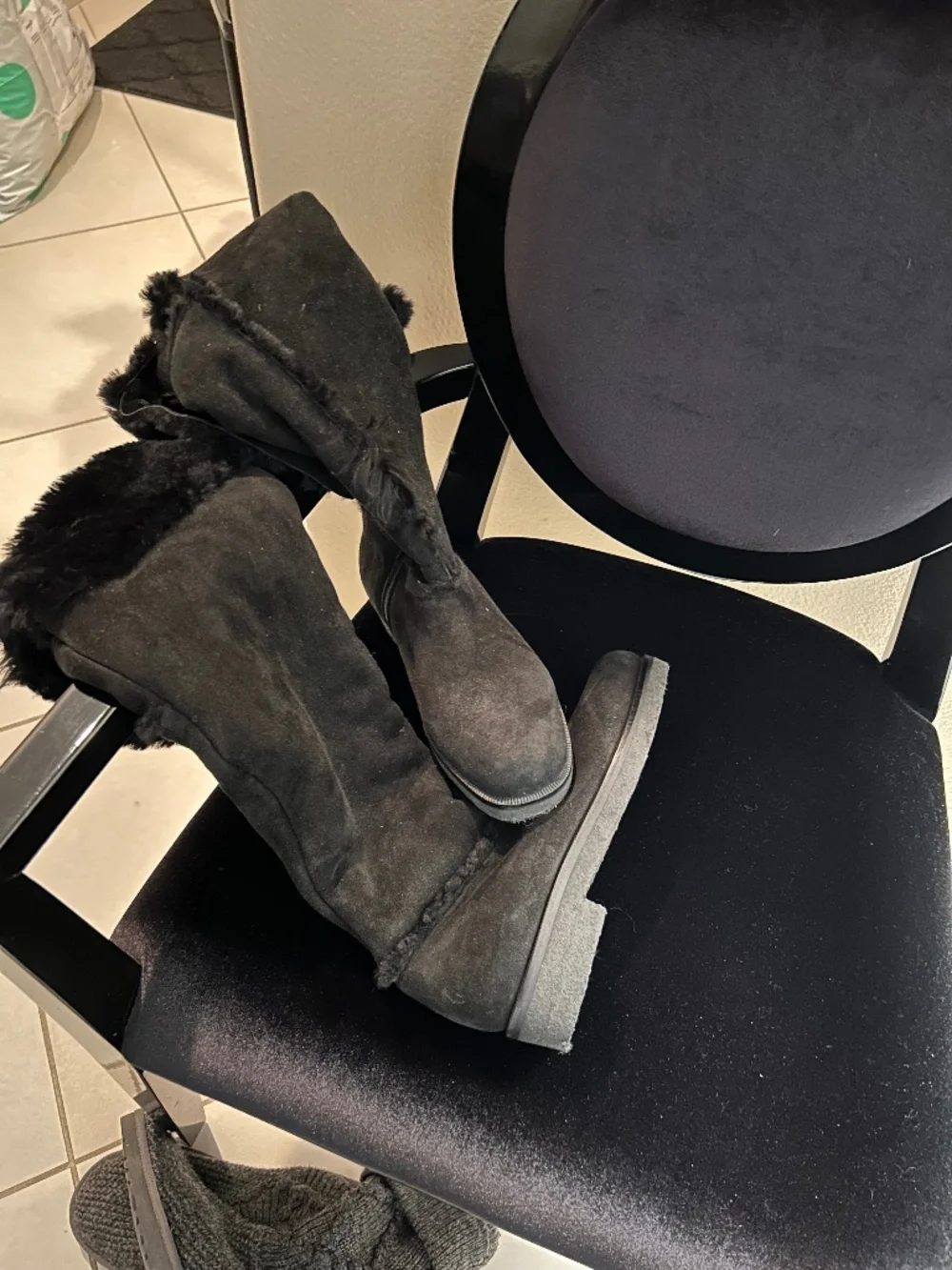Black designer knee high suede boots